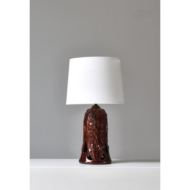 Wonderful ceramics table lamp made by Michael Andersen & Sons, Denmark in the 1920s. The earthenware lamp base was...