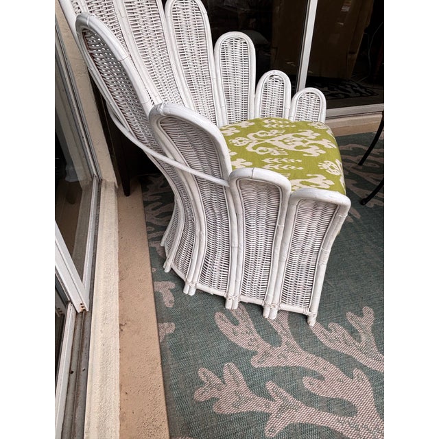 Most liked, vintage Palm frond chair. Chair Restored, enameled white rattan and wicker and custom professionally...