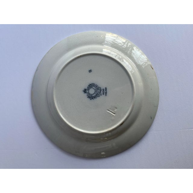 Single round English plate with “Chinese Pattern” chinoiserie style decoration. The polychrome decoration has worn off...