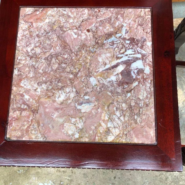 Pair of Chinoiserie Hardwood Marble Inseted Side Tables Heavy carved with floral and geometric patterns carved into the...