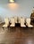 Mid-Century Modern sculptural dining chairs by Henredon. Consisting of two armchairs and six side chairs. Chairs feature...