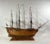 Plank on frame model of the famous English warship HMS Victory. This model is planked in varnished walnut above the...