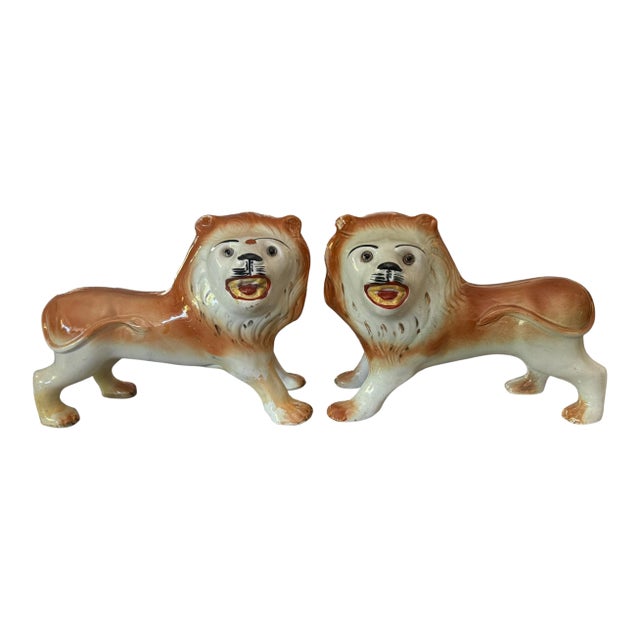 Pair of Large Victorian Staffordshire Pottery Lions With Glass Eyes, C. 1880–1900 For Sale