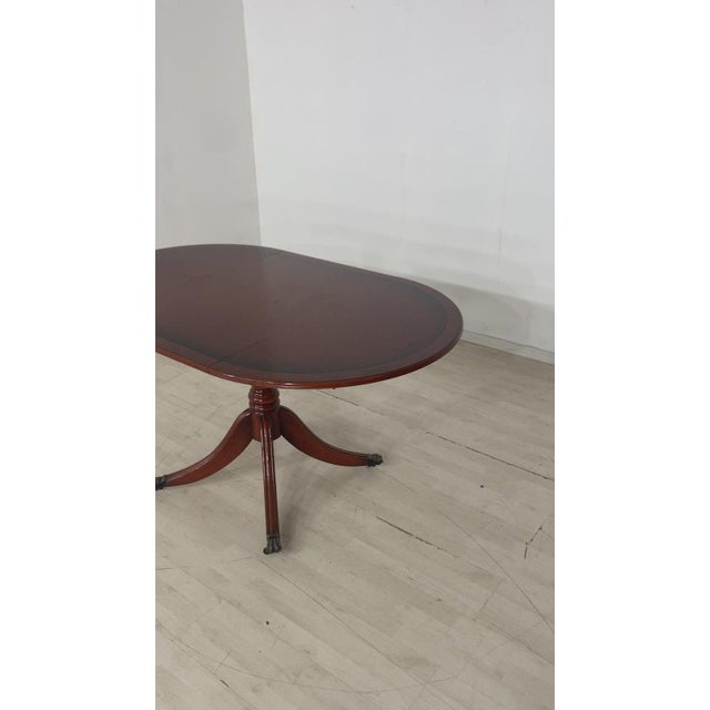 For sale is a very beautiful, extendable mahogany dining table with lion feet. In the last picture you can see the...