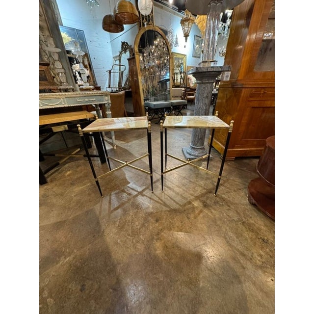These French Directoire' style steel and onyx side tables are a luxurious addition to any living space. Their sleek design...