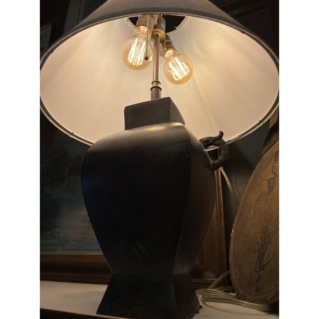 gorgeous Chinese metal double handled urn base lamp. comes with contemporary shade. works great.