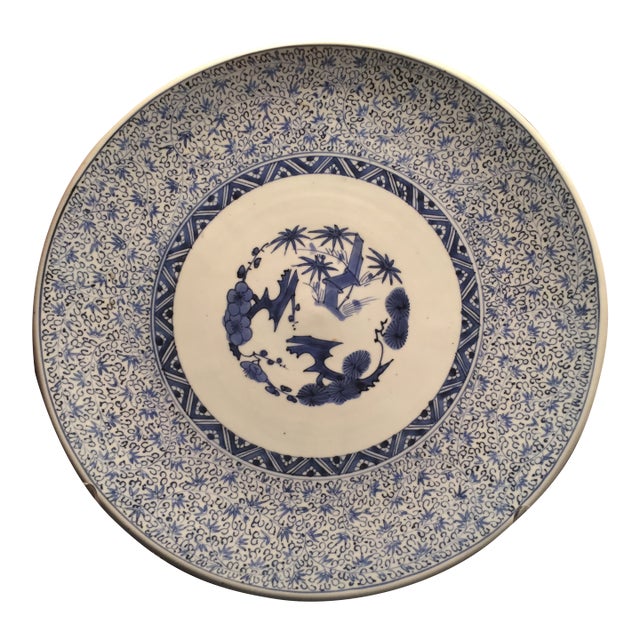 Antique 16" Blue and White Plate With Detailed and Intricate Hand Painting Pine and Plum Design For Sale