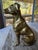 Midcentury solid brass sitting dog figurine. Smooth polished surface and realistic sculpted details. Ready to display on a...