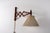This scissor / sax wall lamp features a wooden adjustable arm that extends and folds back smoothly, making it both...