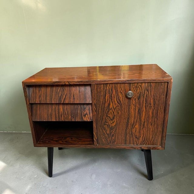 This Portuguese sideboard was manufactured in the 1960s–1970s and is a fine example of Mid-Century Modern design. Crafted...