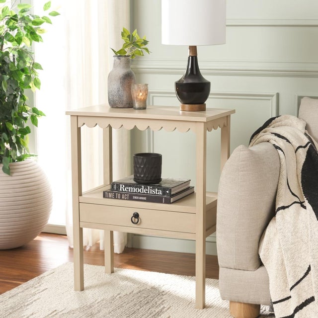 Bring understated elegance to your home with the Haven Low Drawer Accent Table in a warm natural finish. This beautifully...