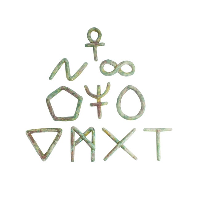 A 1991 set of ten ceramic wall sculptures by the American artist Ana England (born 1953). From England's "Essential...