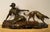 A stunning French Art Deco figural group depicting a Huntress and her Borzoi. The bronze has a beautiful warm patina and...