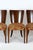 Set of four walnut dining chairs, mod. H-214, designed by Jindrich Halabala for Up Zavody. Manufactured in the 1950s in...