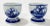 Pair of classic blue and white hand-painted Delft egg cups. Marked on underside. Natural age wear. No chips or cracks.