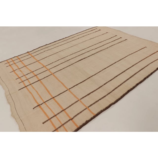 This vintage 7x10 mid-century tribal flatweave is an extraordinary new addition to Rug & Kilim’s Moroccan curations....