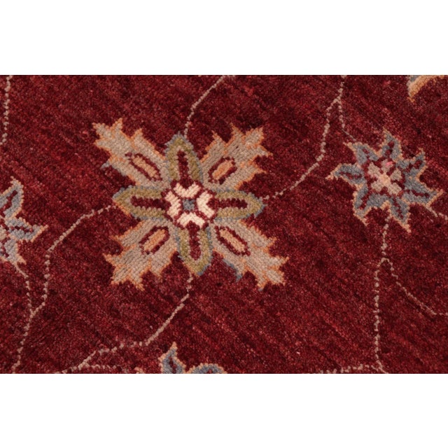 "Enhance the ambiance of your home with this magnificent Persian-influenced Turkish hand-knotted rug made by skilled...
