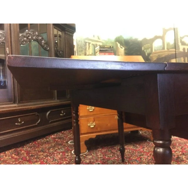 Item: Antique Drop Leaf Table in Mahogany. Age & Condition: Circa 1840. Refinished, good condition. Dimensions: 21″ wide...