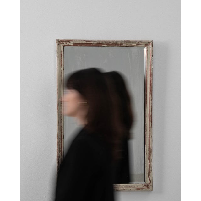 A mirror whose silver/pewter frame, rectangular gives it real character at first glance. The piece dates to 1900s, sourced...