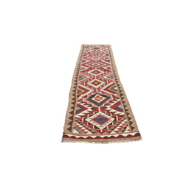 Handwoven vintage decorative kilim runner from Northern Iraq. Approximately 45-55 years old. In very good condition.