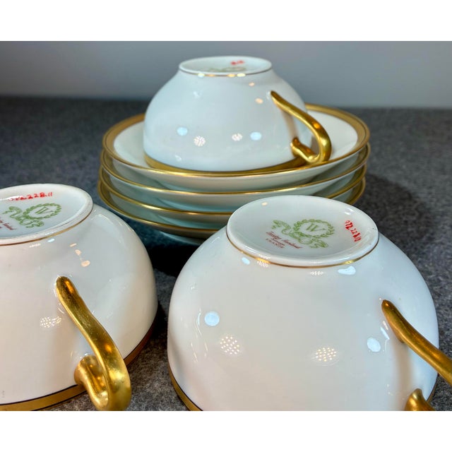 Theodore Haviland (Limoges) art-deco white & gold porcelain cup & saucer set. (3) Cups and (4) saucer plates. C....