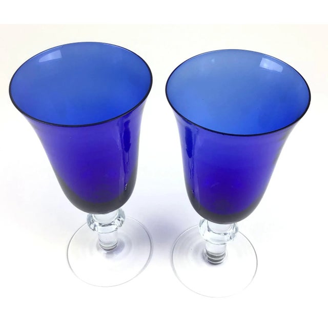Gorgeous shape on this set of glasses. We love the fluted shape with the clear stem and cool curvy details, very easy to...