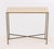 Paul McCobb Style Brass Console Table, with travertine top above brass frame with X-form stretcher. 31" H x 35" W x 11" D....