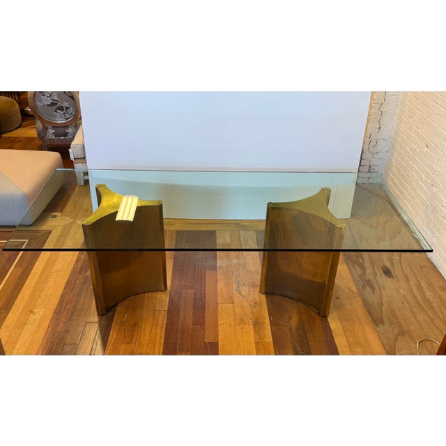 Design Plus Gallery presents a 1970’s Trilobi Brass Double Pedestal Glass Dining Table from Mastercraft. This distinctive...