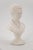 Origin: France. Circa: 1950. Material: Plaster. Note: The bust is really white, the images look darker because of the...