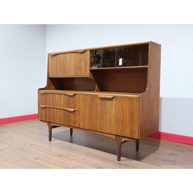 A wonderful mid century piece of furniture made by renowned British furniture Sutcliffe, this Mid Century Modern Vintage...
