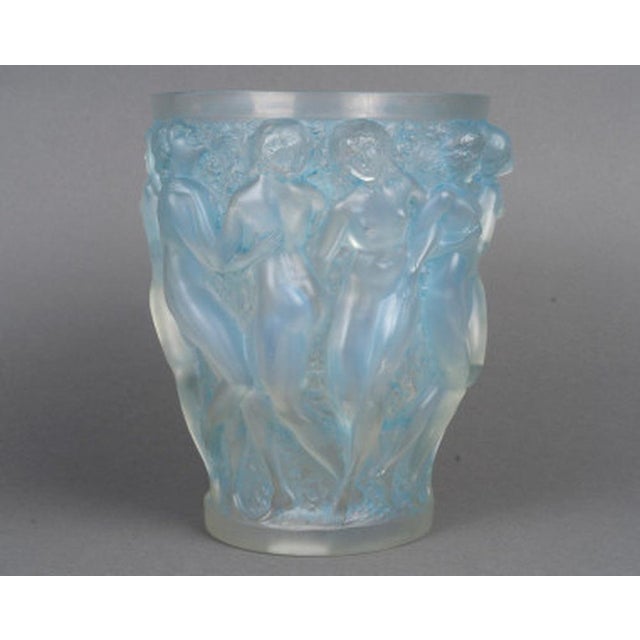 1927 René Lalique - Bacchantes Opalescent Vase "Bacchantes" vase in blue patinated opalescent glass Design created by René...
