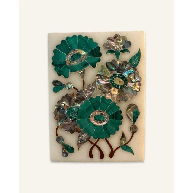 This set of early 20th century East Indian export plaque and box features heavy inlay in a floral motif. The elements of...