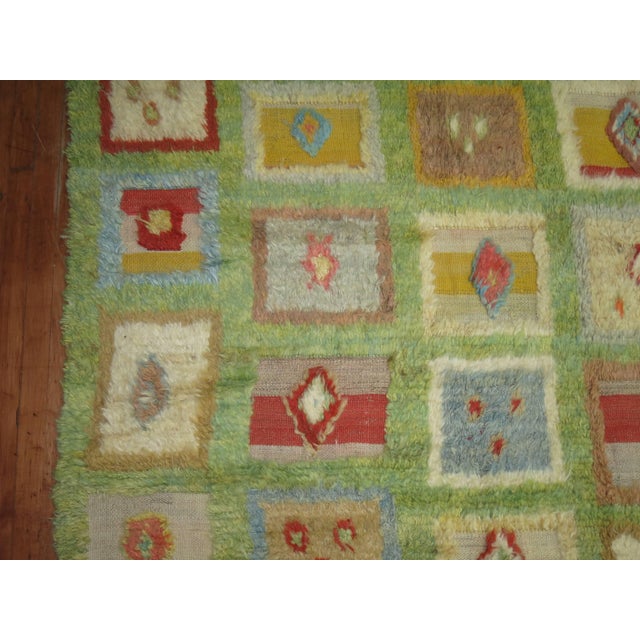 Turkish pile shag rug with an all-over box motif on a green abrashed field. Each box has its own character and charm...