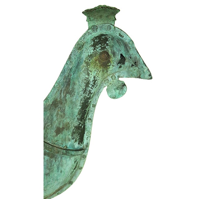 A mid 19th century French folk art copper weather vane in the form of a rooster. French weather vanes are markedly...