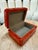Elegant rectangular Italian decorative box featuring rounded corners and a richly mottled red lacquer finish. Its warm...