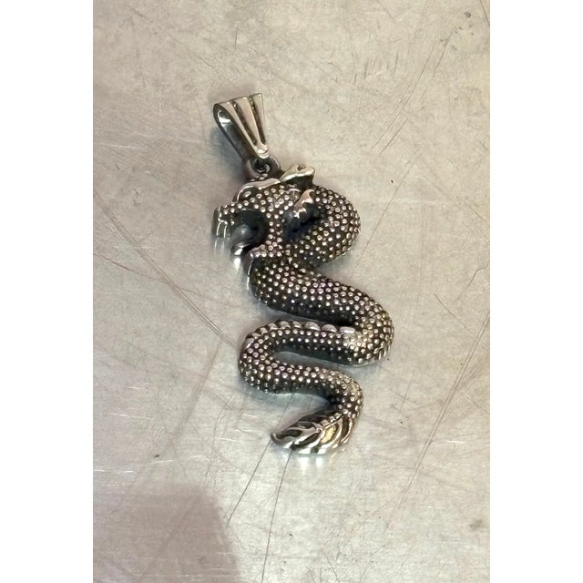 1970s large silver tone Chinese dragon pendant. Excellent condition.