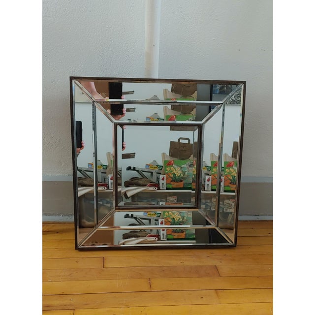 Here's a nice 1980s Art Deco style mirror in the style of LaBarge. The mirror is stepped and beveled. Framed in wood. Very...