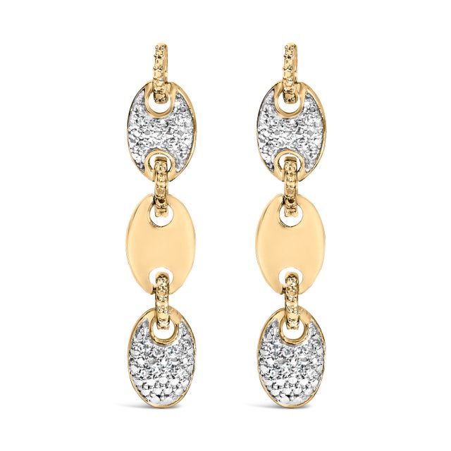 A luminous study in contrast and cadence, these linear drops cascade in three oval stations—an elegant chain of intention....