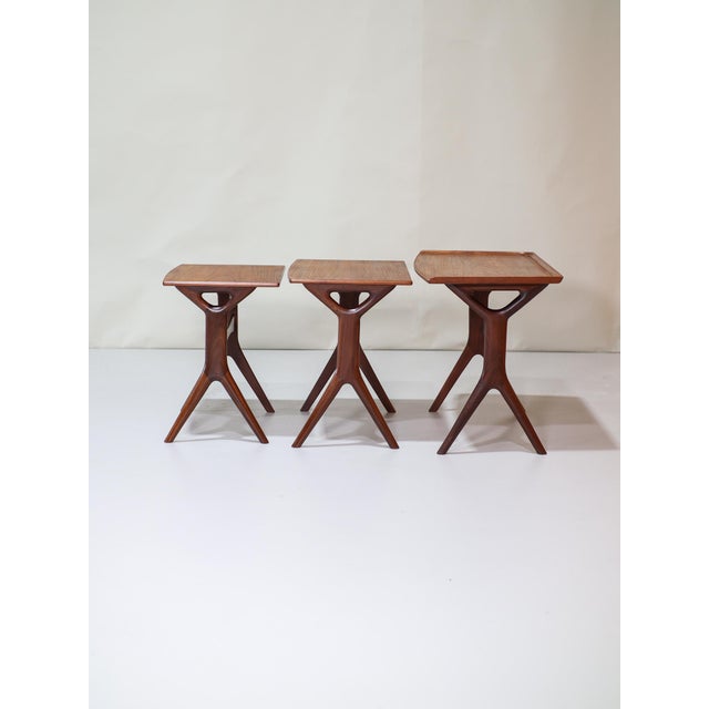 A set of three teak side tables designed by johannes andersen for cfc silkeborg, denmark, 1960s. This rare set of stacking...