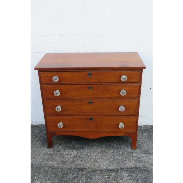 This Classic Chest of Drawers is made out of wood, solid wood, glass, and metal. This classic Chest of Drawers has a...