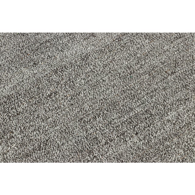 This vintage Kilim is a 6x8 Turkish piece of a most forgiving design, made with handwoven wool circa 1950-1960 and an...