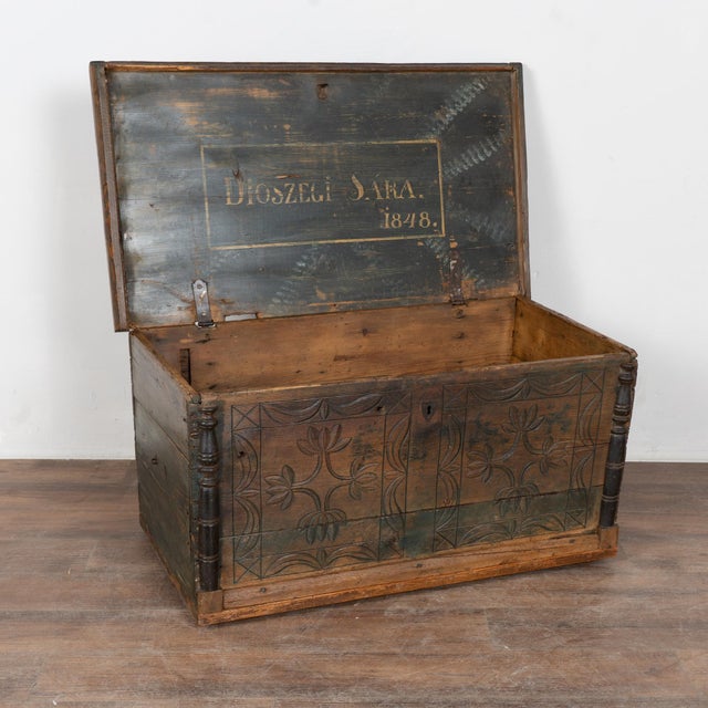 Mid-19th century Hungarian flat top trunk constructed of pine and dated 1848. The front is adorned with attractive carved...