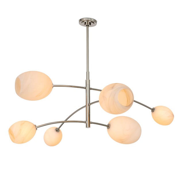 Artemis blends sleek design with the allure of artisan-crafted glass. Its open-ended Alabaster-like glass globes add moody...