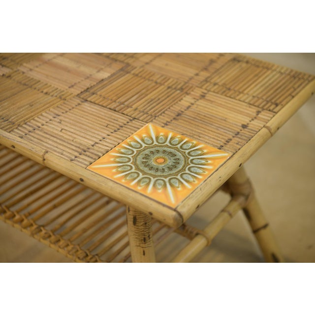 Coffee Table in Rattan and Ceramic attributed to Audoux Minet, 1950s, in Very Good conditions. Designed 1950 to 1959 This...