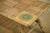 Coffee Table in Rattan and Ceramic attributed to Audoux Minet, 1950s, in Very Good conditions. Designed 1950 to 1959 This...