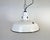 Industrial white enamel factory pendant light made by Abolite in United States during the 1960s. White enamel inside the...