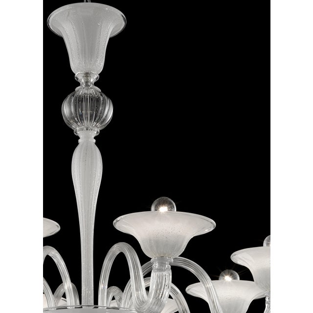 Elegant design for this chandelier with hand-made white and silver leaf in Murano glass For classical and modern...