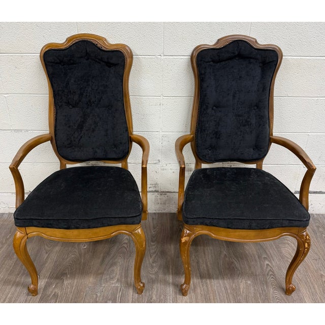 This is a pair of vintage French Provincial armchairs, circa 1960s–1970s, inspired by Louis XV design. Each chair features...