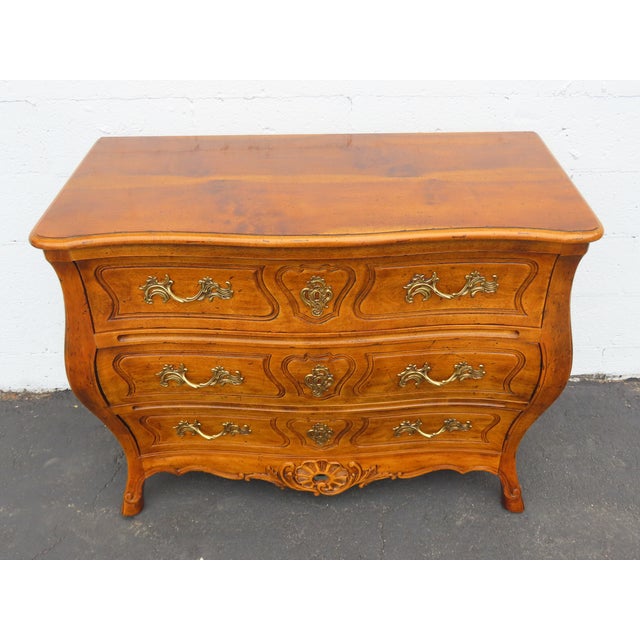 This delightful Dresser is made of wood, solid wood, and metal. The Dresser was made by Henredon the Villandry Collection...