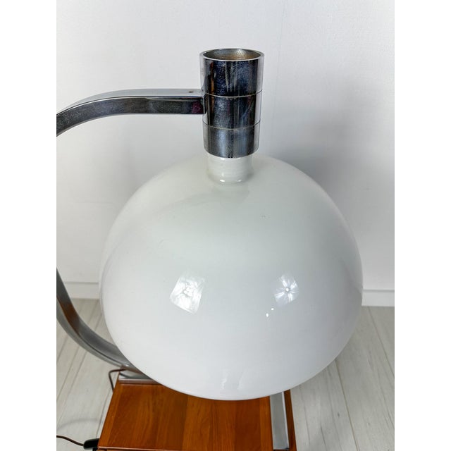 This elegant lamp showcases the timeless mid-century design sensibility of franco albini. With its clean lines and refined...